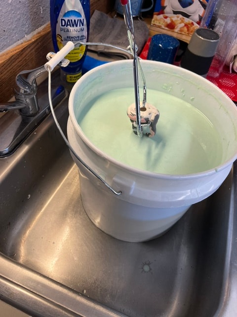 Glaze dipping bucket at the sink