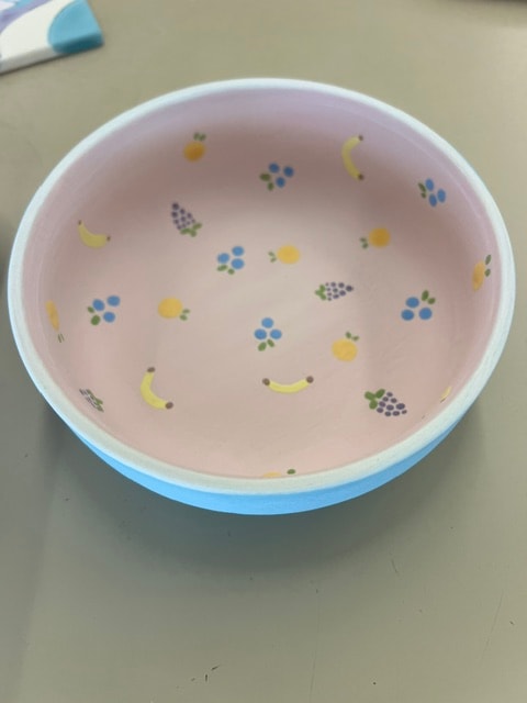 Painted bowl before kiln firing